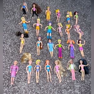 Polly pocket bundle of over 200 pieces. clothes, pets, dollars, accessories